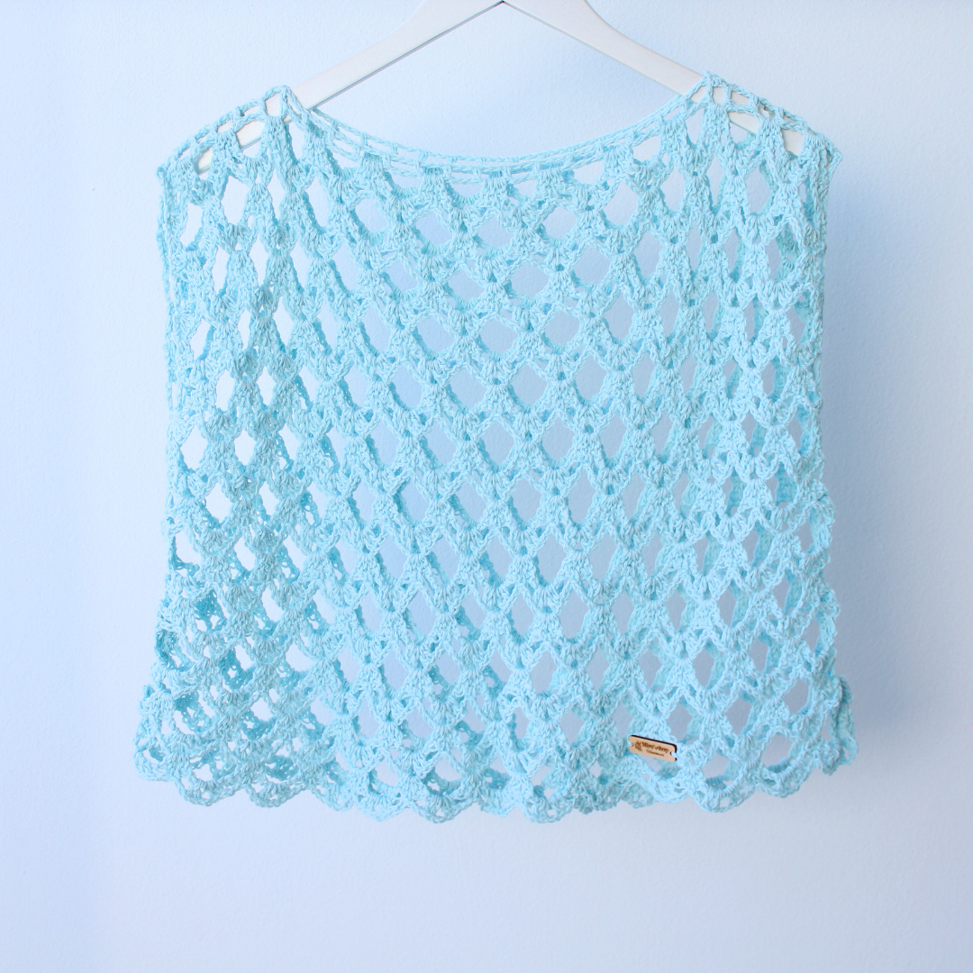 Blusa crochet azul pastel