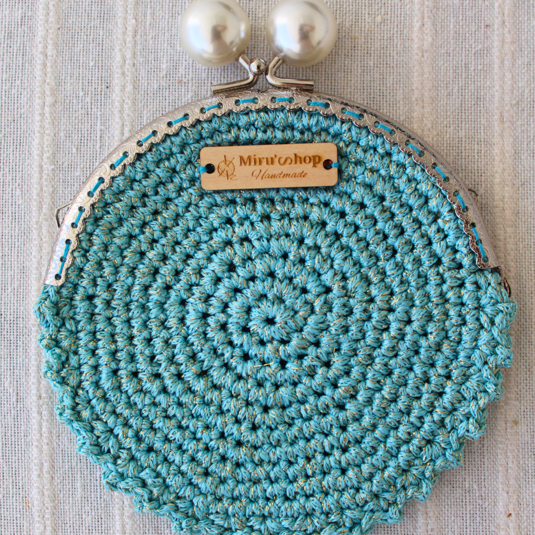 Pearl mouthpiece purse