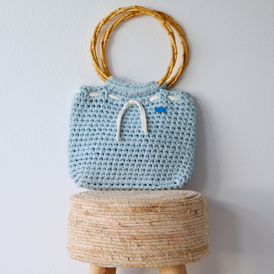 Bag with bamboo handles