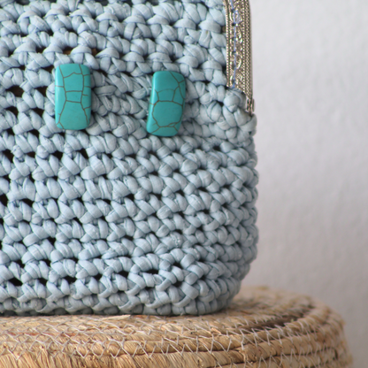 Blue hand clutch with turquoise stones