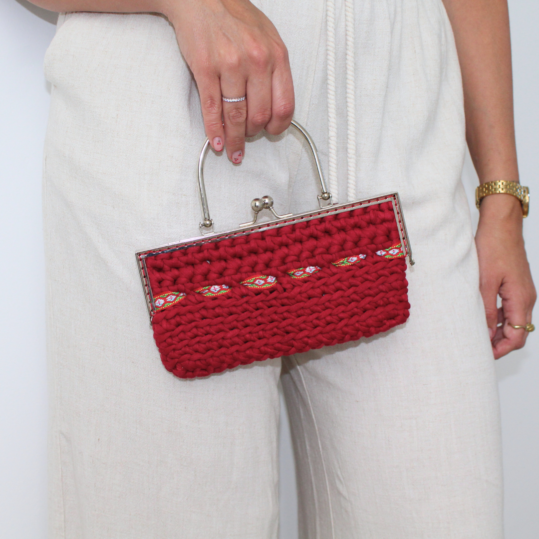 Clutch de mano color vino