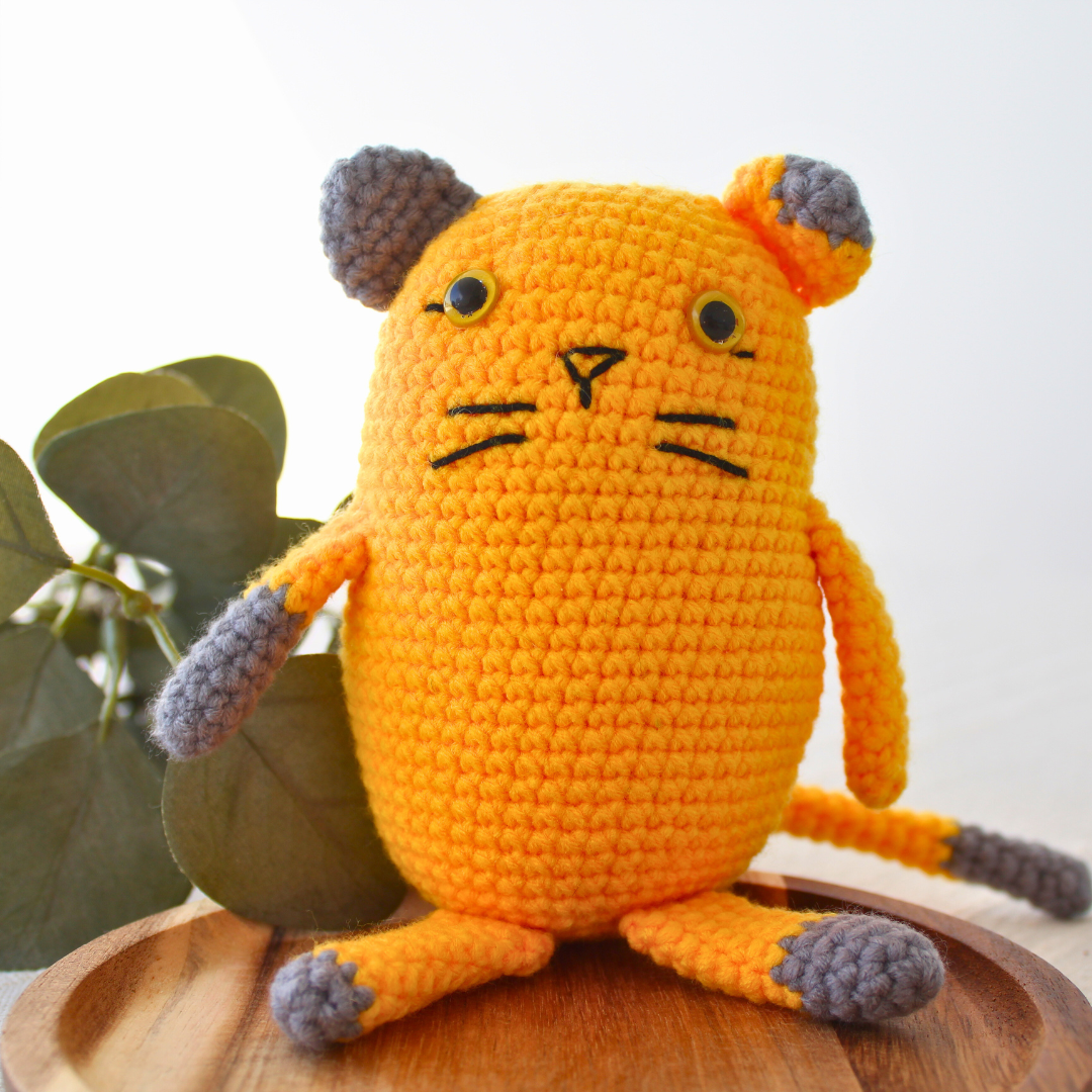 Yellow cat amigurumi plush